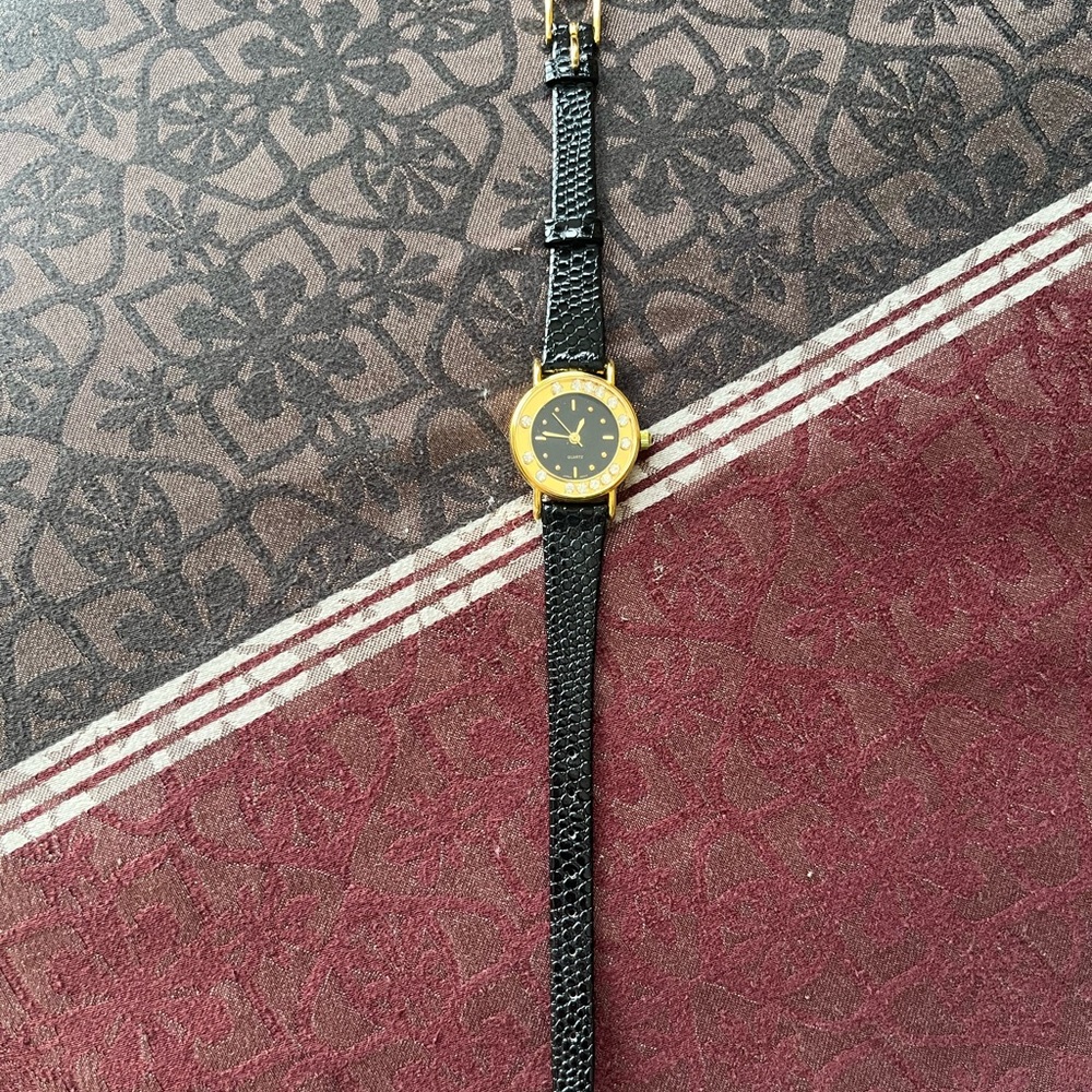 Avon Black and Gold Watch